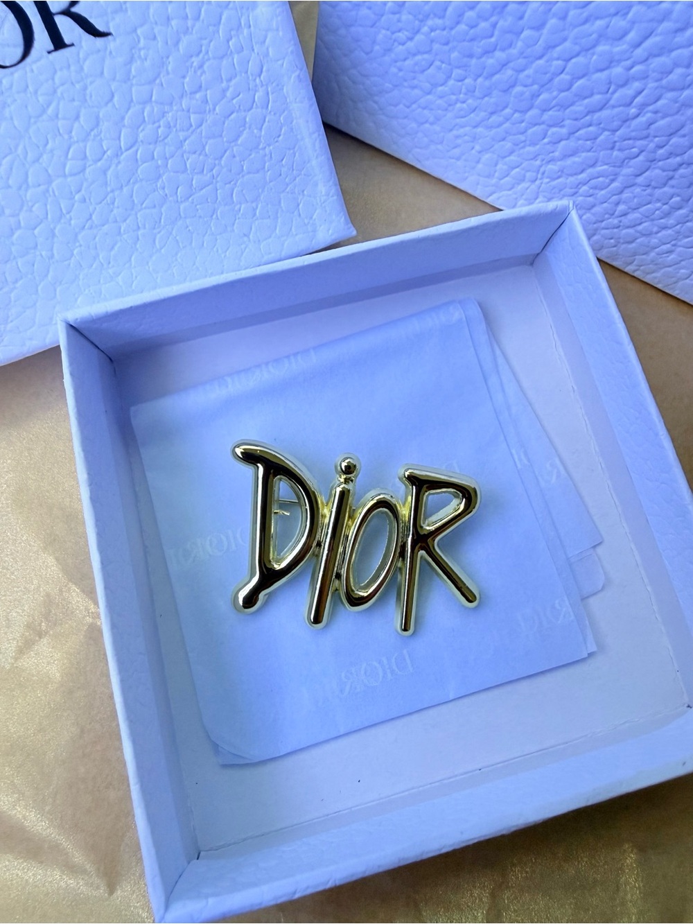 Dior Brooch Pin Cursive Script Logo in Gold Tone New in box with compliment bag
